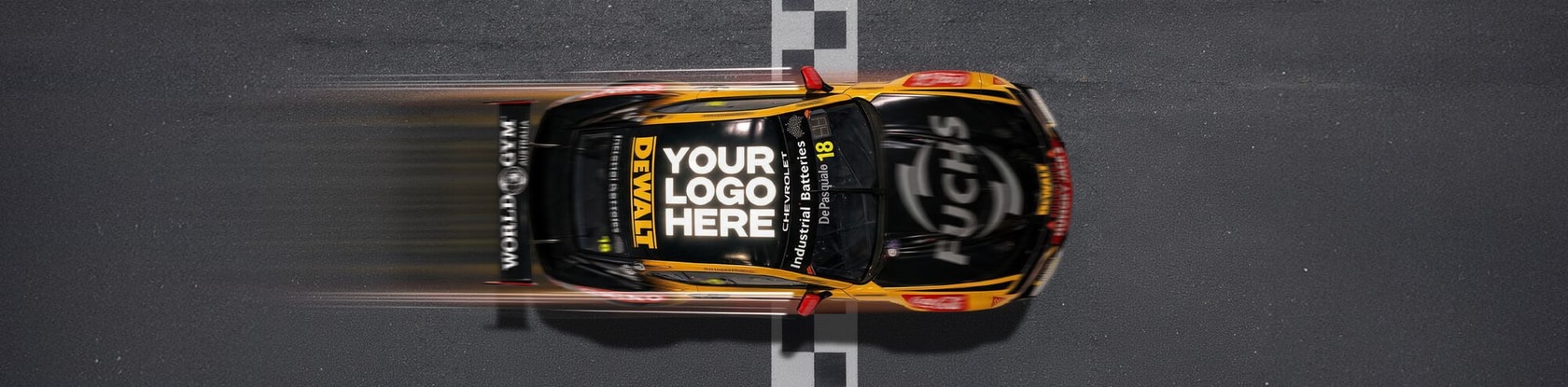 Top view of a DEWALT-branded race car crossing a finish line with 'Your Logo Here' on the roof.